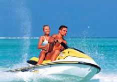 two people riding on a jet ski