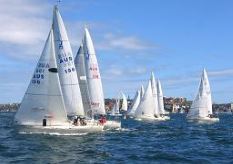 several medium sized yachts in a race